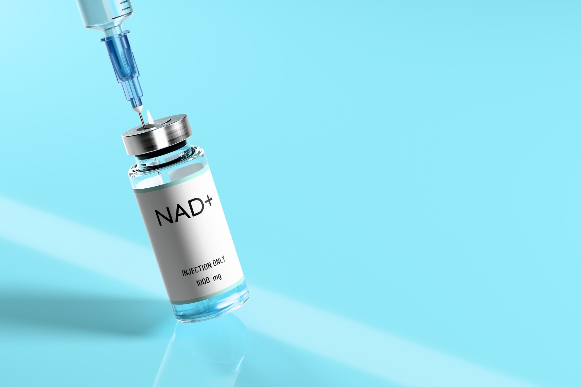 NAD. Syringe and vial for injection on blue background.
